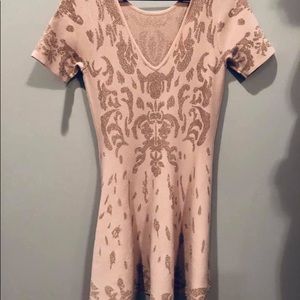 Ivanka Trump blush and rose gold dress.
